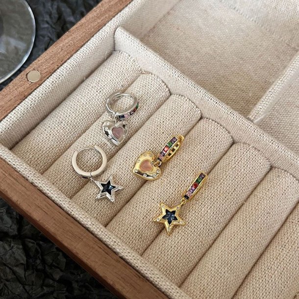 Donnatella reringe slv med  stjerne og rainbow sten