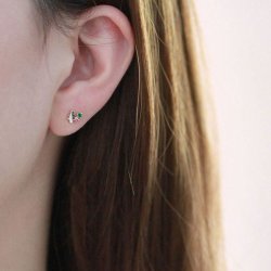 Donnatella reringe forgyldt med juletr og elg